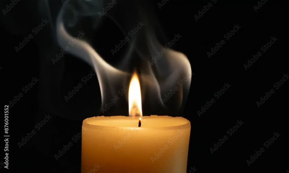 Candle blow out with smoke isolated on black background