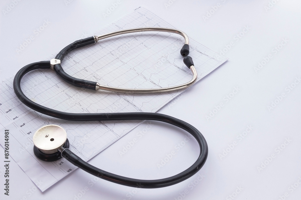 Stethoscope, cardiogram and the image of the heart on light background Stethoscope, cardiogram and the image of the heart on light background