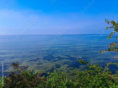 Swimming on SUP board on Pucka Bay. Poland photo