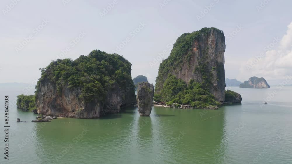 Aerial top view of Khao Phing Kan, Ko Ta Pu, Phang Nga, lush green trees from above in tropical forest in national park in summer season. Natural landscape background. Aerial top view of Khao Phing Kan, Ko Ta Pu, Phang Nga, lush green trees from above in tropical forest in national park in summer season. Natural landscape background.
