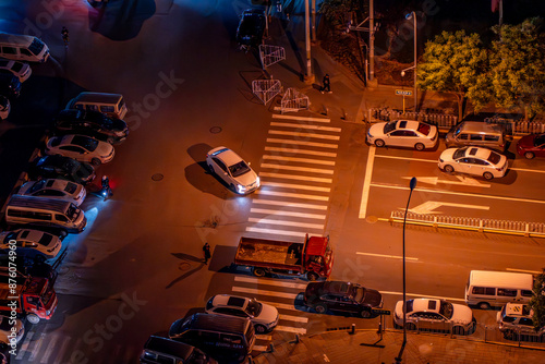 China Beijing night street intersection vehicles and pedestrians