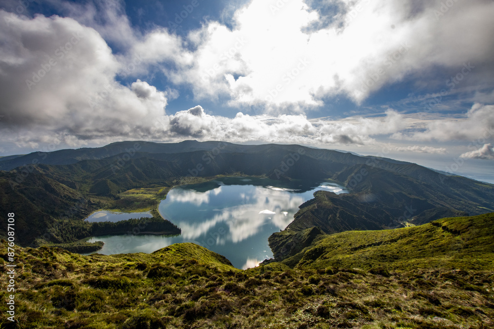 Miradouro do Lagoa do Fogo, Azores, Ponta Delgada, Isla Sao Miguel. Scenic landscape in trekking friendly path over cloudy mountains and green landscape scenario. Azores and trekking travel tourism Miradouro do Lagoa do Fogo, Azores, Ponta Delgada, Isla Sao Miguel. Scenic landscape in trekking friendly path over cloudy mountains and green landscape scenario. Azores and trekking travel tourism