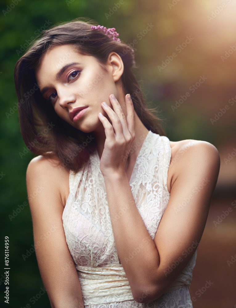 Naklejka premium Woman, portrait and garden with eco fashion, fairytale and flowers in hair with confidence outdoor. Spring, park and elegance in forest and woods with princess, green and glamour style in nature
