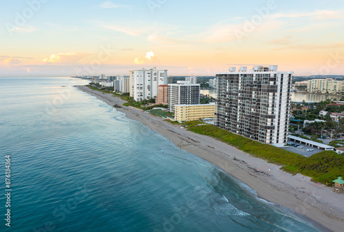 Luxury condos along the Florida Atlantic coast in Boca Raton, Florida during sunrise.  photo