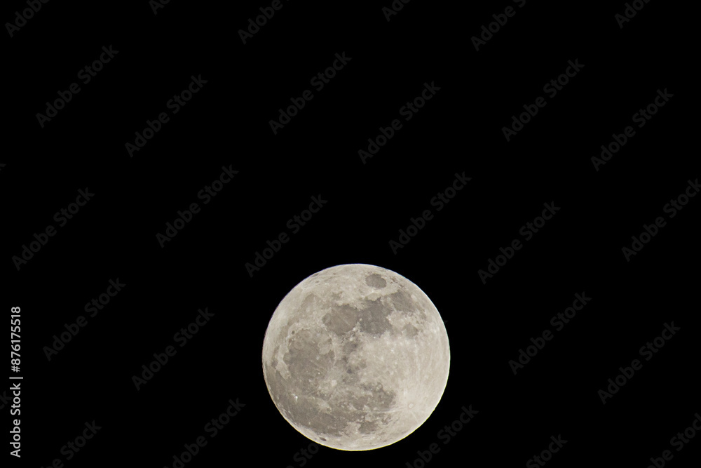 Full moon in black sky at night Full moon in black sky at night