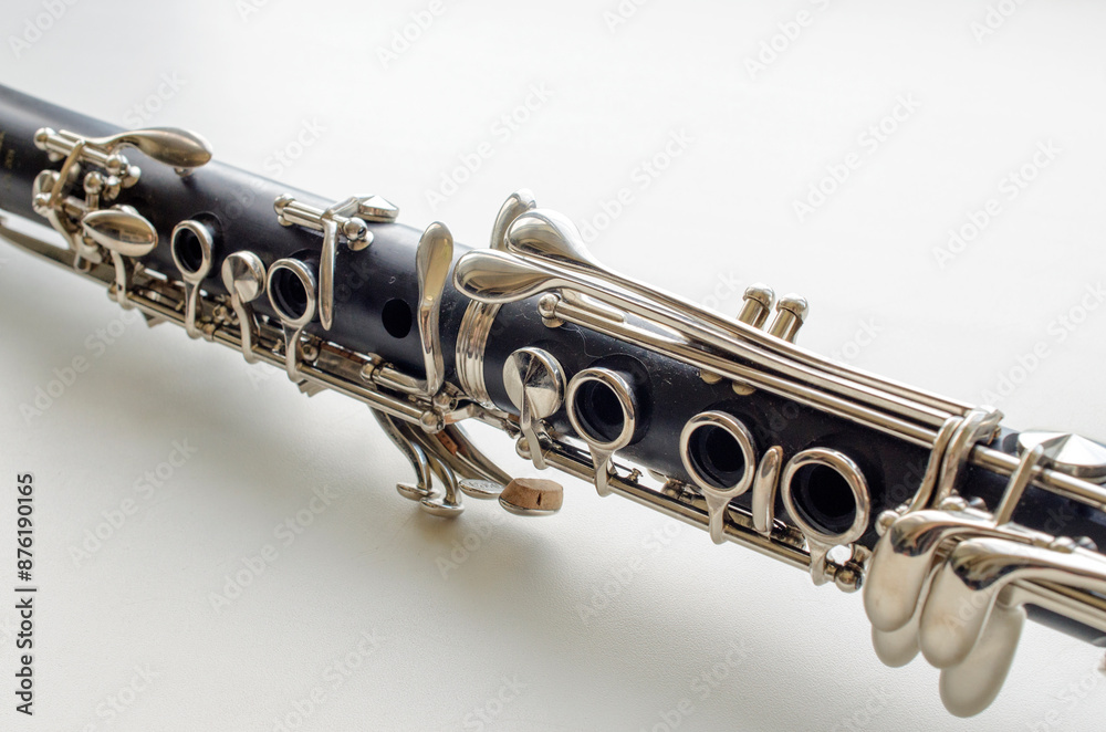 Fototapeta premium French system clarinet close-up on a light background
