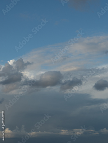 Blue sky. Beautiful Cumulus clouds flying across the sky,