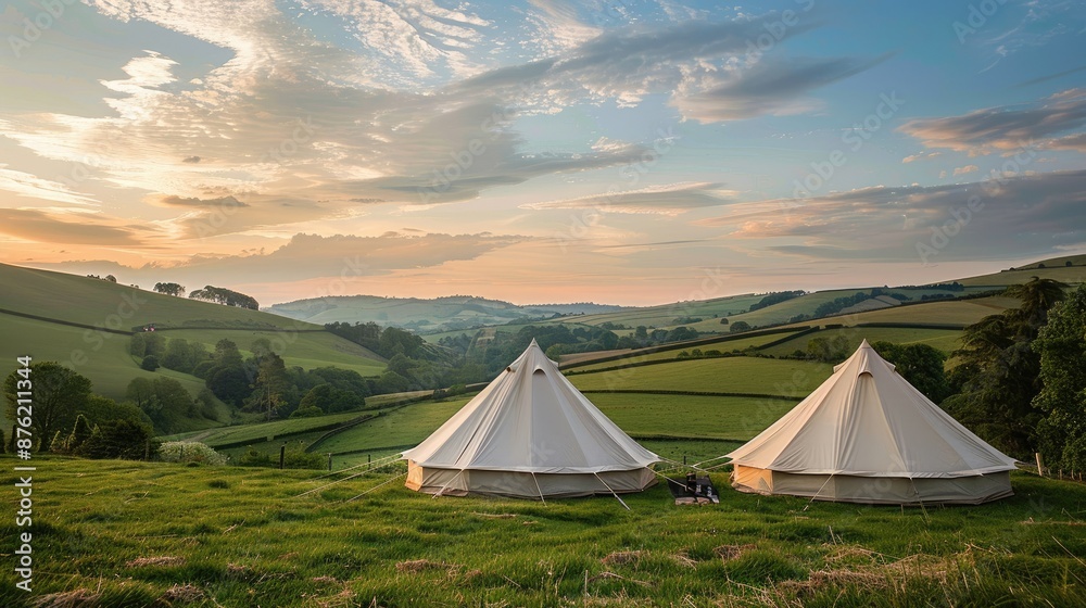 Comfortable luxury tents set against a backdrop of rolling countryside Comfortable luxury tents set against a backdrop of rolling countryside