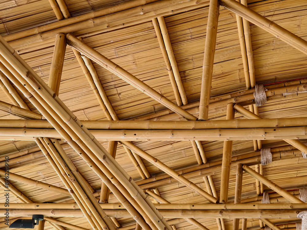 A detailed view of a wooden bamboo ceiling with perforations A detailed view of a wooden bamboo ceiling with perforations