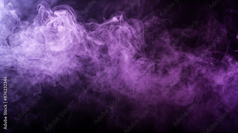 Purple mist spreading on a black background evokes the atmosphere of peace and harmony, characteristic of aromatherapy. Purple mist spreading on a black background evokes the atmosphere of peace and harmony, characteristic of aromatherapy.