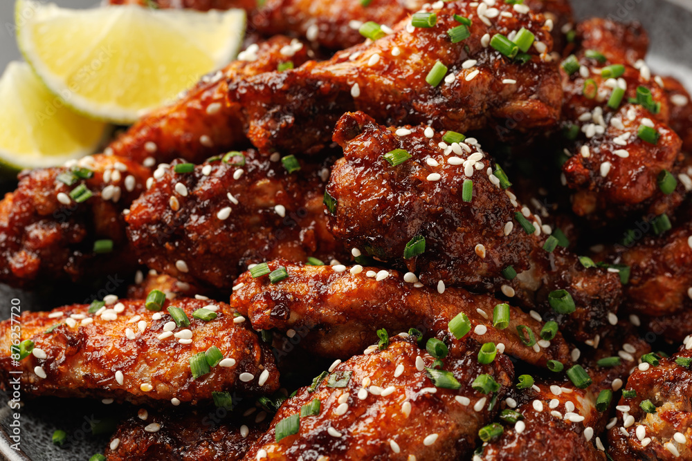 Spicy korean chicken wings with sesame seeds and chives Spicy korean chicken wings with sesame seeds and chives