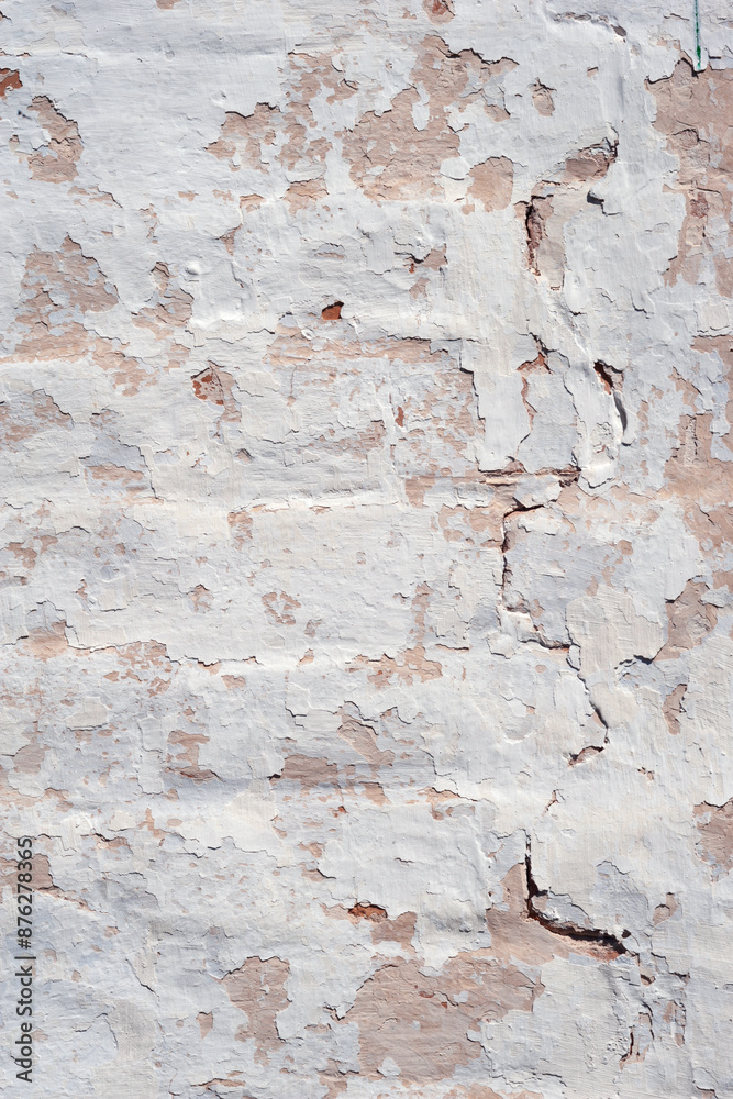 Plaster texture. Peeling plaster on a brick wall Plaster texture. Peeling plaster on a brick wall