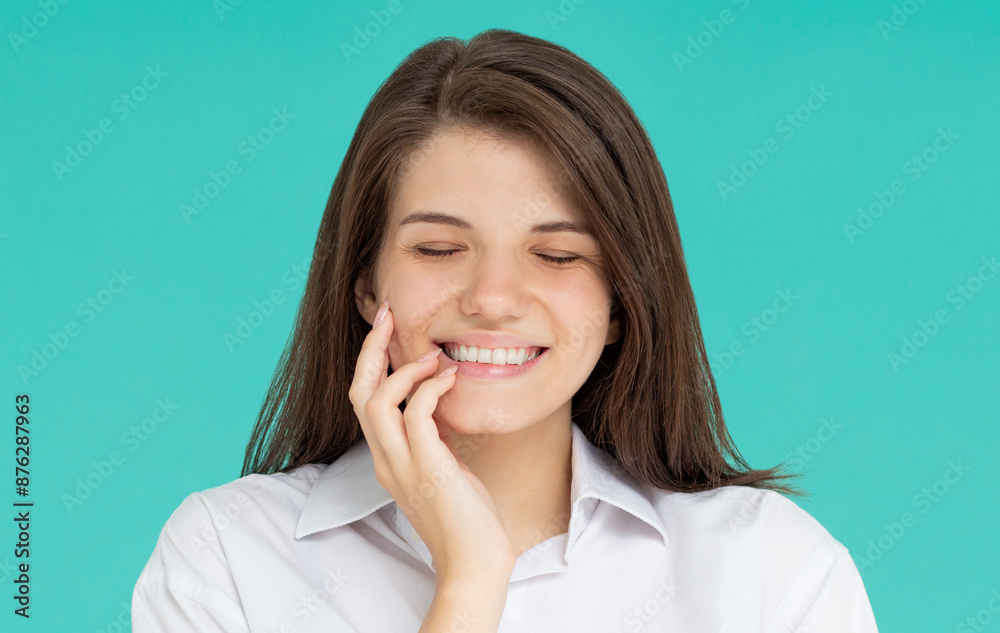 Beautiful caucasian woman dreamy smiling with eyes closed, standing relaxed and happy against blue background. Copy space Beautiful caucasian woman dreamy smiling with eyes closed, standing relaxed and happy against blue background. Copy space