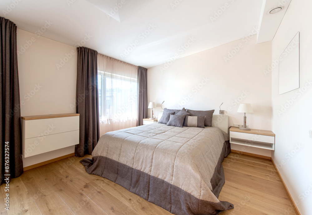 Luxurious master bedroom interior, modern house, beautiful interiors, wide bedroom. King Size Bed Luxurious master bedroom interior, modern house, beautiful interiors, wide bedroom. King Size Bed