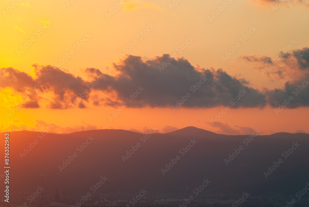 Golden hour sunset with cloudy horizon, sunset over Tupras refinery Golden hour sunset with cloudy horizon, sunset over Tupras refinery