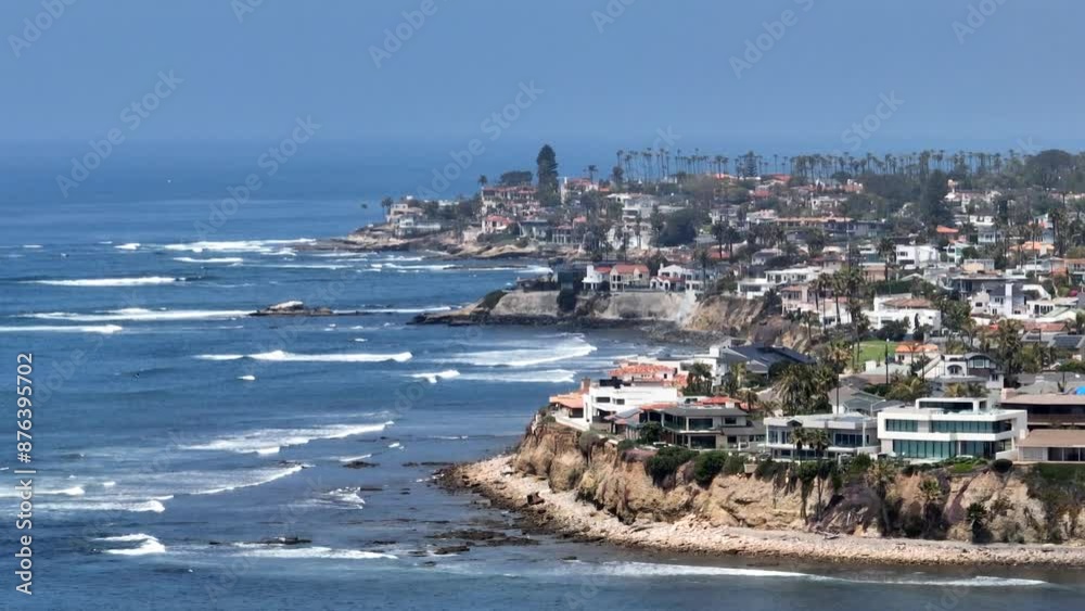 Aerial view of Pacific Beach Coastline on a sunny day in San diego California with people enjoying the beach and park Aerial view of Pacific Beach Coastline on a sunny day in San diego California with people enjoying the beach and park