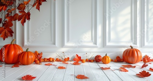 Orange Pumpkins and Autumn Leaves on White Wood Floor With White Paneled Wall