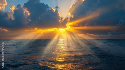 Dramatic Sunset Over the Ocean With Golden Rays of Light