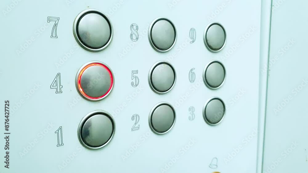 Elevator, metal buttons on the panel. Rise in the elevator of the house. Elevator, metal buttons on the panel. Rise in the elevator of the house.