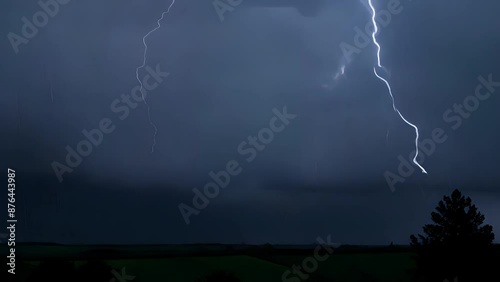 An Intense lightning storm over the countryside, time lapse