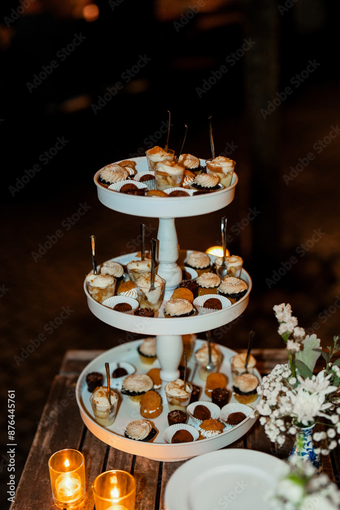 Dessert Tiered Display for a Wedding with Cupcakes Dessert Tiered Display for a Wedding with Cupcakes