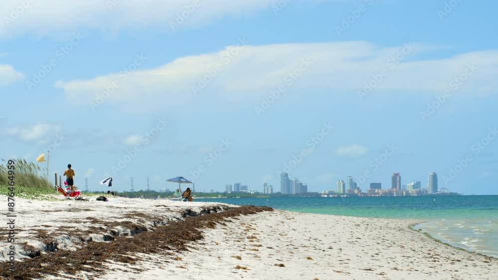 Beach at Key Biscayne, Florida USA, with Miami Skyline in Distance Beach at Key Biscayne, Florida USA, with Miami Skyline in Distance