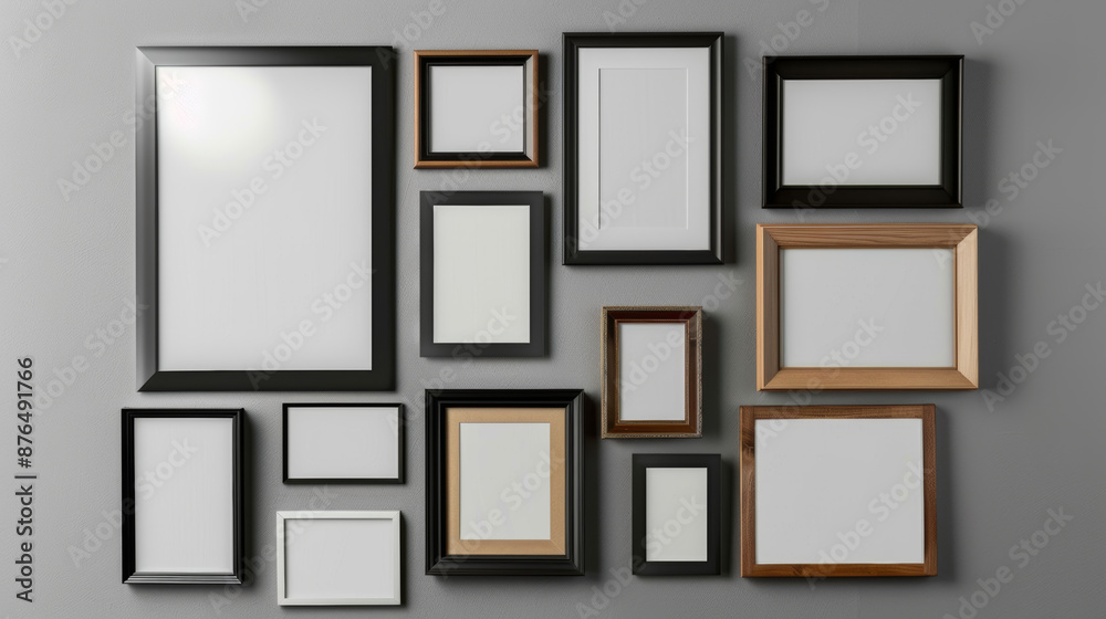 Create a mood board with empty photo frames and glued samples on a gray wall. You can add photographs or film snapshots to the frames. Create a mood board with empty photo frames and glued samples on a gray wall. You can add photographs or film snapshots to the frames.