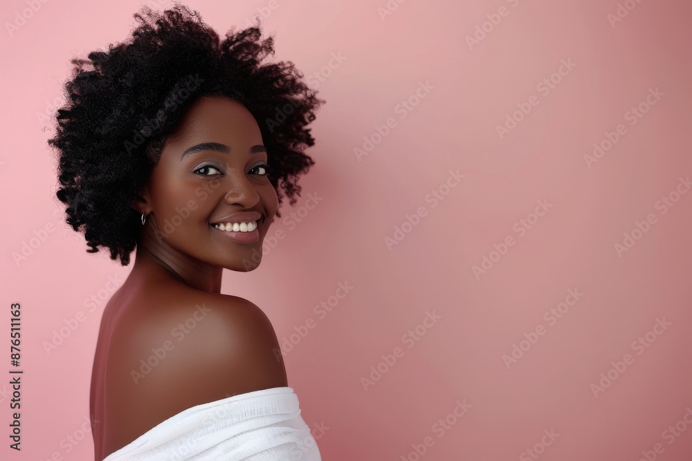 Beautiful Afro american woman with flawless skin. Skincare concept. Beautiful young black girl practicing skincare. smooth face touches her healthy facial skin. Copy space for text.