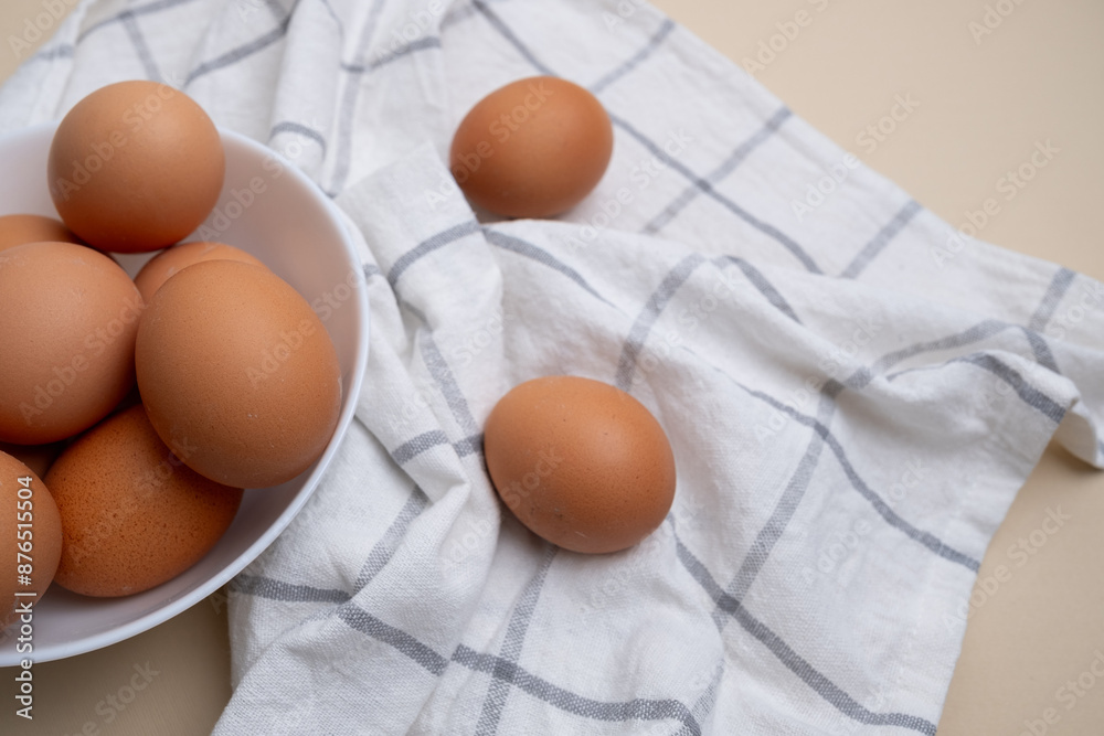 Chicken eggs. Bowl with raw eggs on the table. Natural organic farm product. Preparing for Easter. Delivery of fresh products. Raw ingredient for cooking Chicken eggs. Bowl with raw eggs on the table. Natural organic farm product. Preparing for Easter. Delivery of fresh products. Raw ingredient for cooking