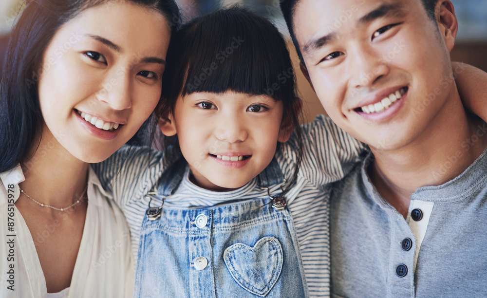Asian family, portrait and happy in home with hug for bonding, support and relationship together. Mother, father and young girl in house with smile, trust and care for love, relax and weekend leisure Asian family, portrait and happy in home with hug for bonding, support and relationship together. Mother, father and young girl in house with smile, trust and care for love, relax and weekend leisure