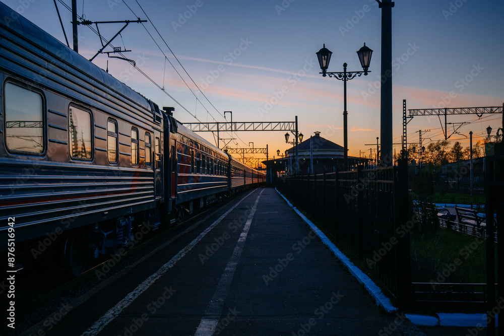 Fototapeta premium Sunset at railway station in Small Vishera, Leningrad oblast