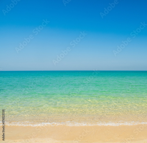 Horizon beautiful landscape summer season vertical front view tropical sea beach white sand clean blue sky cloud background calm nature ocean wave water travel holiday relax at island sun day time