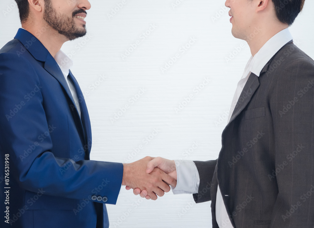 Business team man asian group stand on wall white look and shake hand with in agreement congratulation cooperate successful new plan project ready for happy work marketing sale in room office company Business team man asian group stand on wall white look and shake hand with in agreement congratulation cooperate successful new plan project ready for happy work marketing sale in room office company