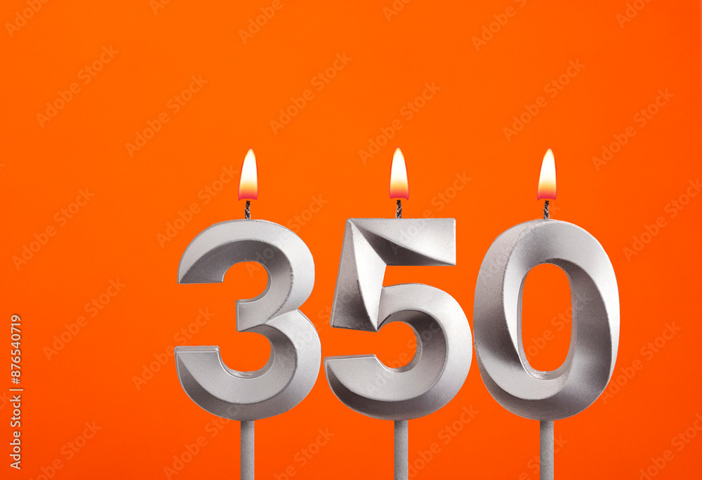 Candle number 350 - Birthday in orange background Candle number 350 - Birthday in orange background