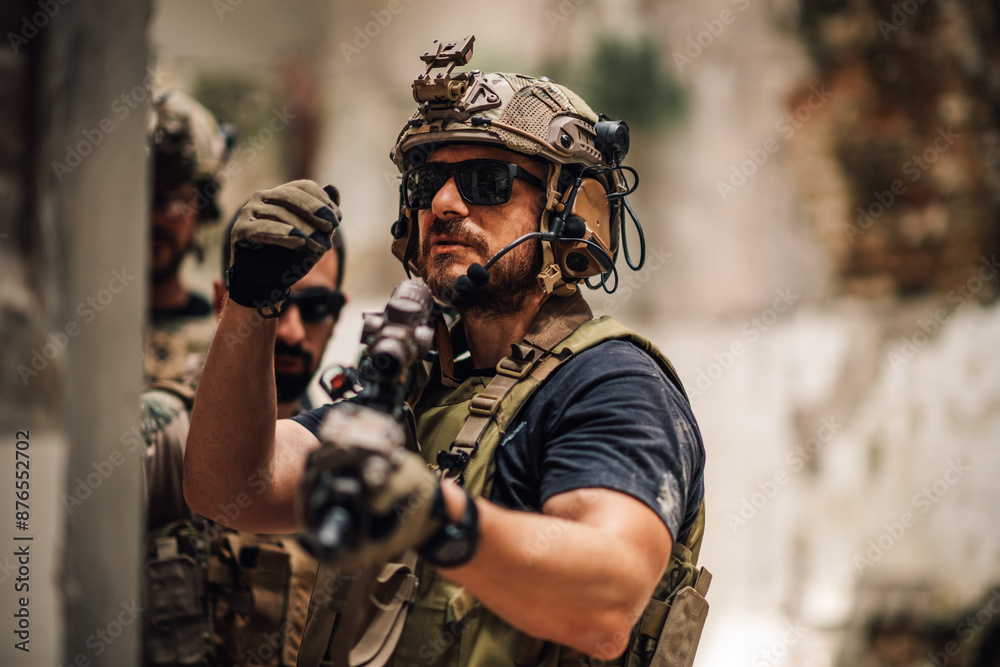 Portrait of air soft warrior with weapon indicates free movement. Portrait of air soft warrior with weapon indicates free movement.