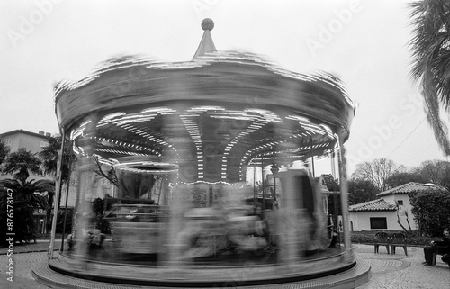 merry go round in park in Antibes French Riviera in black and white
