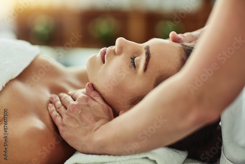 Hands, massage and face of woman for relax, beauty and treatment for client on bed. Towel, spa or lymphatic drainage in salon by masseuse person, facial or stress relief for cosmetic therapy service