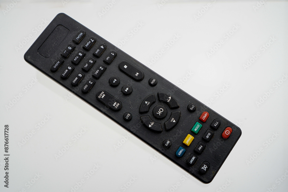 Close-up of remote control for television on white background with clipping path. tv remote isolated on white. Close-up of remote control for television on white background with clipping path. tv remote isolated on white.