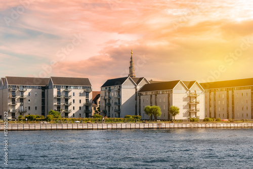 Various photos from the city center of Copenhagen the capital of Denmark harbor palace churches colorful buildings canals and general city view with cloudy weather and sunset colors