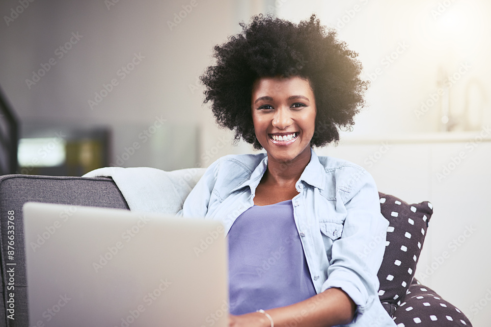 African woman, portrait and laptop on sofa in house for internet, networking and streaming with smile. Technology, face and remote work as social media manager for company, agency or business in home African woman, portrait and laptop on sofa in house for internet, networking and streaming with smile. Technology, face and remote work as social media manager for company, agency or business in home