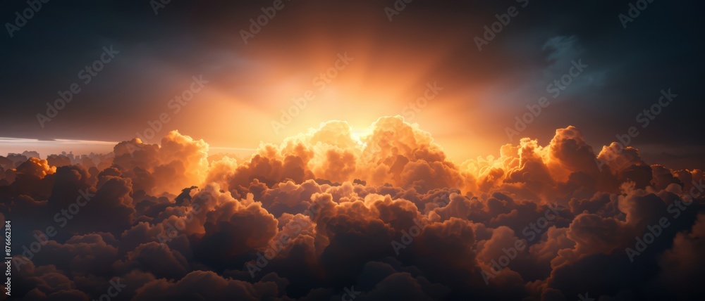Stunning Sunset Over Dramatic Cloudscape with Golden Light and Dark Shadows