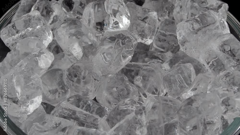 Ice cubes background, many large ice cubes rotate filling up the screen.