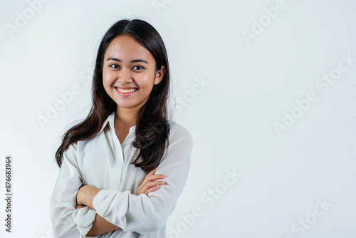 A studio portrait of a beautiful young Asian Indonesian woman