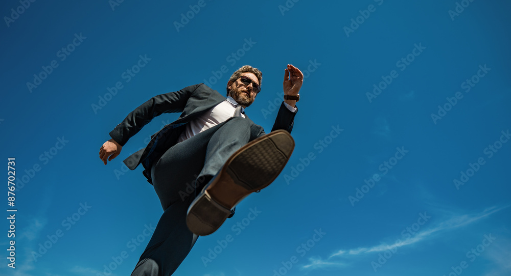 Obraz premium Businessman go step on sky. Next Steps. Business Ambitions concept. Goal business success strategy. Creative growth development. Growth business success process. Steps Forward. Step by step.
