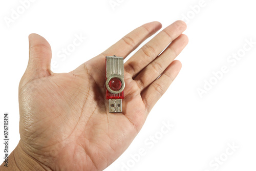 Man's hand holding a red usb drive or flashdisk on a white background. isolated white background