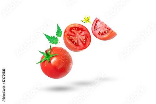Flying tomato has water drop with slices and leaf isolated on white background , clipping path.