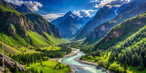  Breathtaking River Valley with Lush Green Hills and Snow-Capped Mountains Under Clear Sky