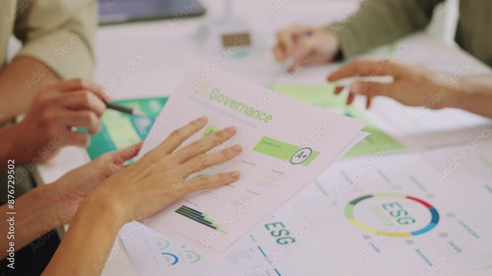 close up diversity team brainstorming focused on ESG (environment,social,governance) for sdgs goals in a sustainable green office close up diversity team brainstorming focused on ESG (environment,social,governance) for sdgs goals in a sustainable green office