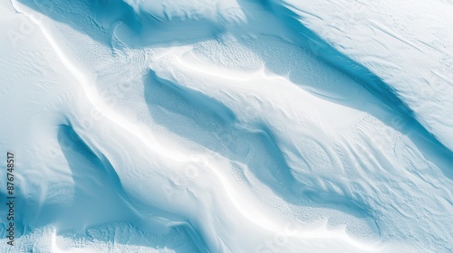 Wallpaper Mural Aerial view of snow-covered mountain ridges and valleys creating abstract patterns in winter landscape, showcasing natural beauty and textures. Torontodigital.ca