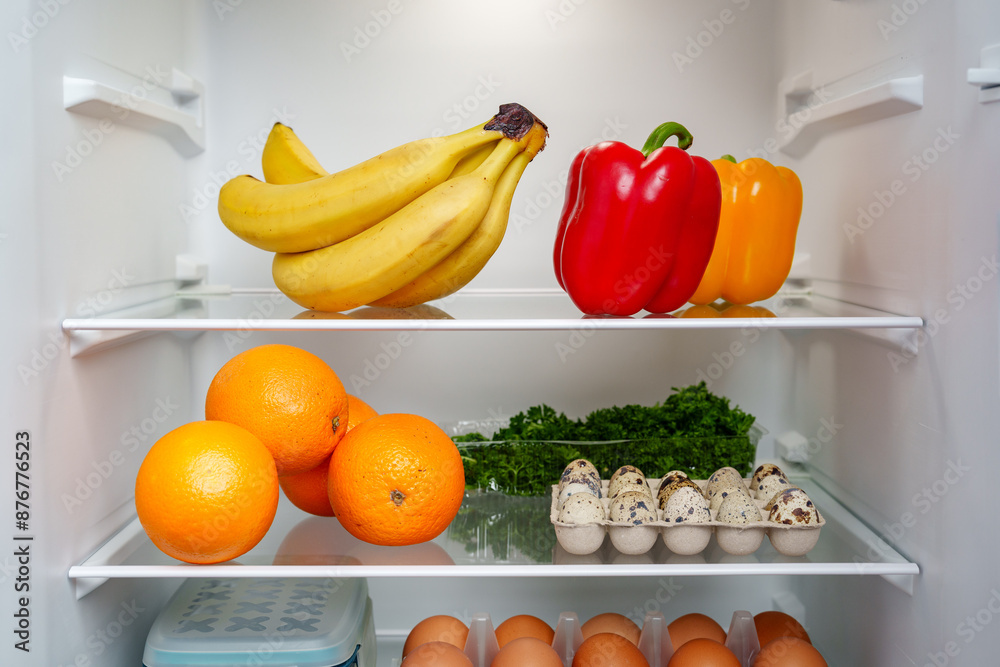 Well-Stocked Refrigerator With Fresh Produce, Eggs, and Other Groceries Well-Stocked Refrigerator With Fresh Produce, Eggs, and Other Groceries